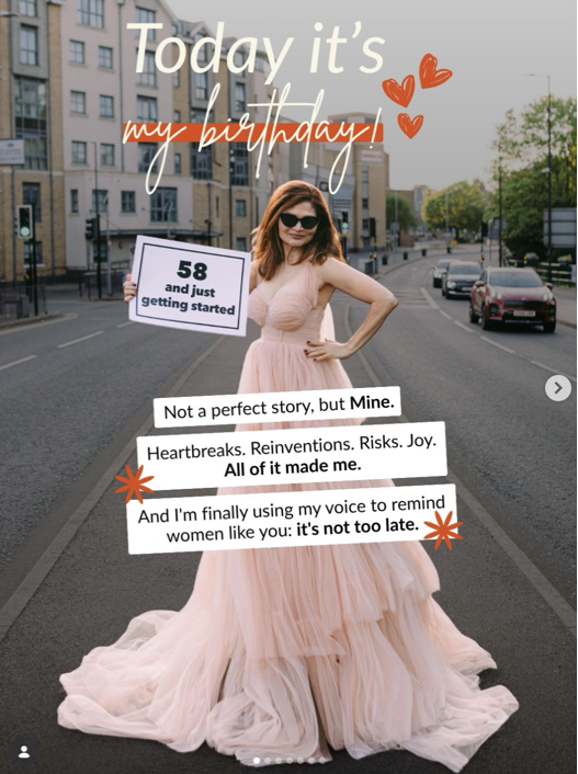 Adriana Welham celebrating her birthday, holding a sign that reads '58 and just getting started'